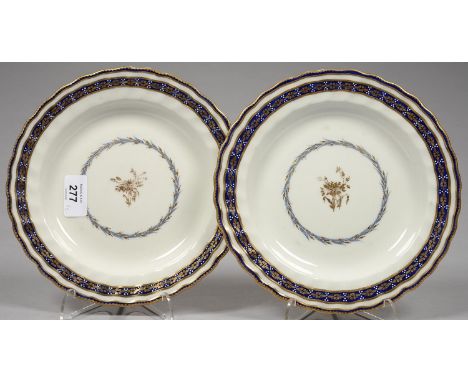 A PAIR OF DERBY BLUE AND GILT DESSERT PLATES WITH FLUTED SMITH'S BLUE, WHITE ENAMEL AND GILT FLOWERHEAD RIBBON BORDER AND SCA