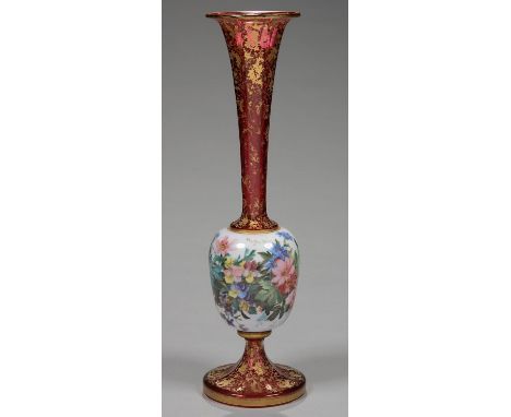 A FRENCH OR BOHEMIAN ENAMELLED OVERLAY GLASS VASE WITH ATTENUATED RUBY GLASS NECK AND FLARED FOOT, PAINTED WITH FLOWERS AND G