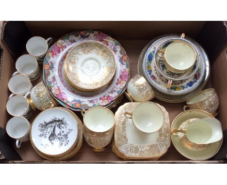 A TUSCAN CHINA CREAM GROUND GILT TEA SERVICE, A SET OF ROYAL WORCESTER BLACK PRINTED FANCY BIRDS COFFEE CANS AND SAUCERS, ETC