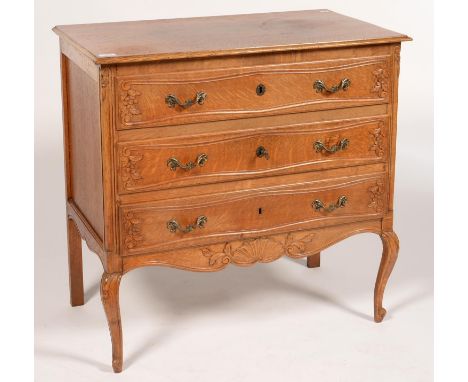 A CARVED OAK COMMODE IN LOUIS XV STYLE, 80CM H; 80 X 45CM, 20TH C  Top is splitting and has some light marks / stains