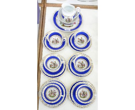 A CZECHOSLOVAKIAN BLUE GROUND PORCELAIN TEA SERVICE, PRINTED AND PAINTED WITH FANCY BIRDS AND GILT, LARGER PLATE 21CM D, PRIN