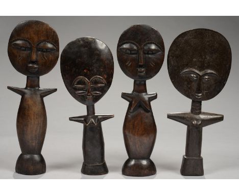 TRIBAL ART. FOUR AFRICAN CARVED WOOD DOLLS, 34CM H AND CIRCA  Good condition