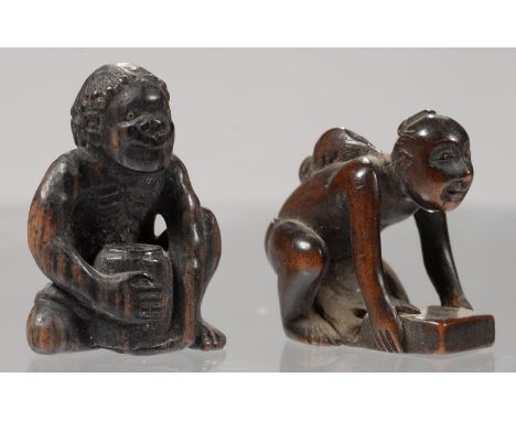 TWO JAPANESE BOXWOOD NETSUKES OF A CROUCHING MAN AND SEATED ASCETIC, 3.2 AND 4CM H, THE FIRST SIGNED  Crouching man - in good