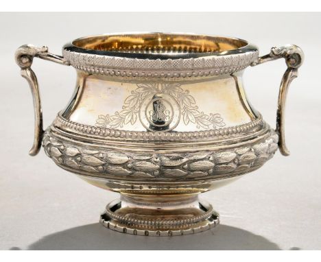 A CONTINENTAL SILVER SUGAR BOWL, PROBABLY&nbsp;AUSTRO-HUNGARIAN, OF WAISTED FORM WITH ANGULAR HANDLES AND EMBOSSED WITH ENCIR