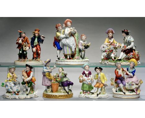 SEVEN VOLKSTEDT AND SITZENDORF GROUPS OF CHILDREN, INCLUDING FLOWER GATHERERS, MUSICIANS OR ITINERANTS, 11 - 16CM H, PAINTED 