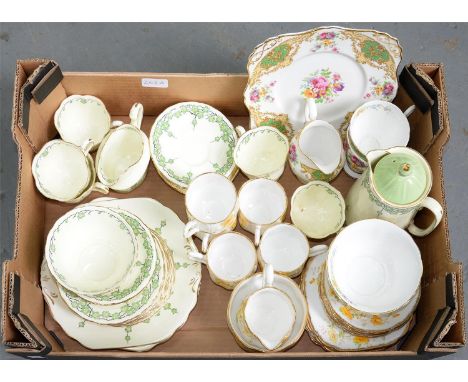 A NEW CHELSEA BONE CHINA MAYTIME PATTERN TEA SERVICE, A ROYAL ALBERT CROWN CHINA FLORAL TEA SERVICE AND A SMALL QUANTITY OF T