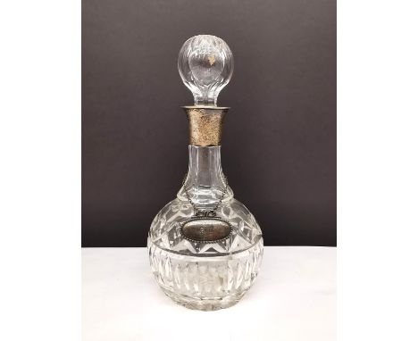 A Mappin &amp; Webb cut crystal decanter with silver collar and EPNS 'Gin' label. (hair line crack to glass neck). H.28cm 