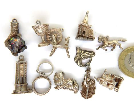 Ten silver charms, combined 40g. P&amp;P Group 1 (£14+VAT for the first lot and £1+VAT for subsequent lots) 
