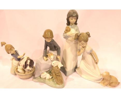 Four Nao girls with animals, largest H: 23 cm. Girl with dog missing left arm, otherwise no cracks, chips or visible restorat