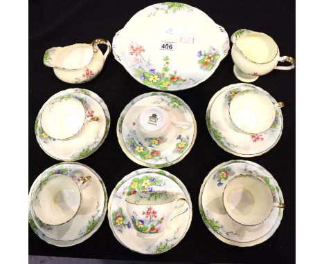 Twenty one piece Aynsley floral pattern ceramic tea set. Generally n chips, cracks or visible restoration. Not available for 