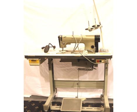 A Pfaff industrial sewing machine on treadle base. Not available for in-house P&P, contact Paul O'Hea at Mailboxes on 01925 6