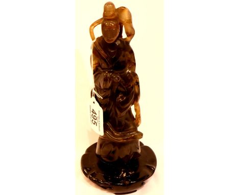 Substantial carved jade immortal figure raised on a carved circular base, figure has had repair, H: 26 cm. P&amp;P Group 2 (£