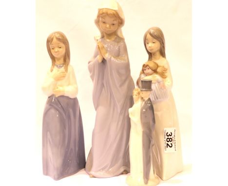 Three Nao girls, largest H: 27 cm and a small Nao Bride and Groom. No cracks, chips or visible restoration. P&amp;P Group 3 (