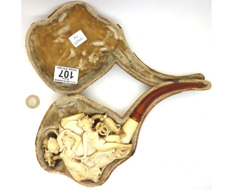 19th Century oversized carved Meerschaum pipe, decorated with maidens and putti, amber mouthpiece (cracked) and presented in 