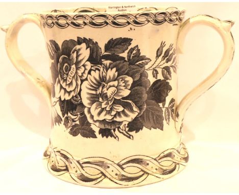 19th Century Staffordshire ceramic Loving cup of large proportions, The interior with four frogs, H: 17 cm, large crack and c