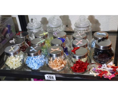 Quantity of small bows in jars, various colours. P&amp;P Group 3 (£25+VAT for the first lot and £5+VAT for subsequent lots) 