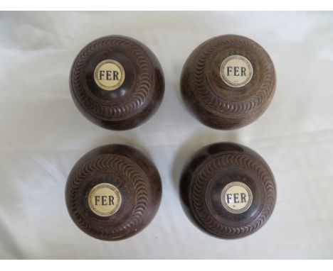 4x Vintage bowls / woods, initialled with 'FER'.