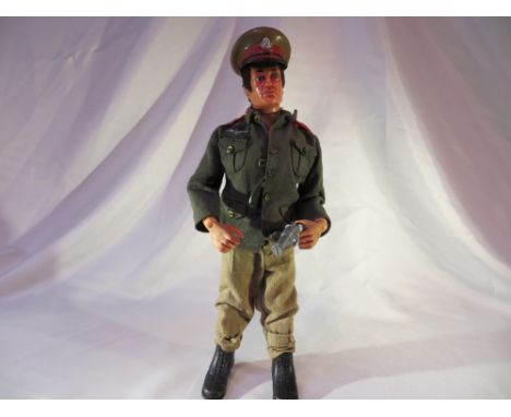 A Palitoy talking Action Man.