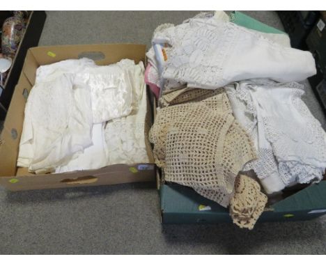 A selection of vintage christening gowns/day dresses together with a tray of vintage textiles to include embroidered examples