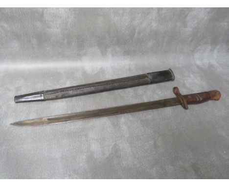 A WW1 Remington bayonet with scabbard 