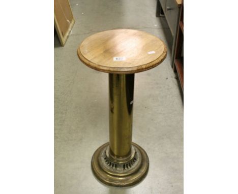 Circular Oak Top Table, the base made from a Brass Military Shell