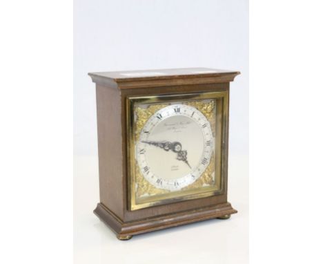Elliott wooden cased Mantle clock with Silvered Dial & Cherubs, marked "Garrard & Co Ltd London"