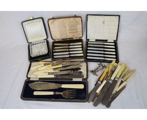Five cased Art Deco mother-of-pearl handled butter knives (one missing) a cased set of six mother-of-pearl handled butter kni