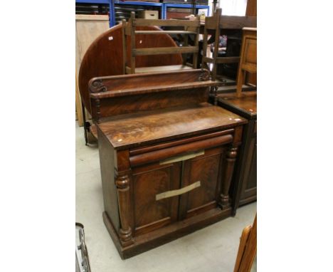 19th century Mahogany Chiffonier, the upstand with scroll carved back and single shelf above a cushion drawers and two cupboa