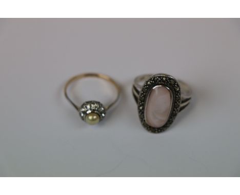 A 9ct yellow gold and silver pearl and paste set cluster ring, ring size M and a silver mother-of-pearl and marcasite cluster