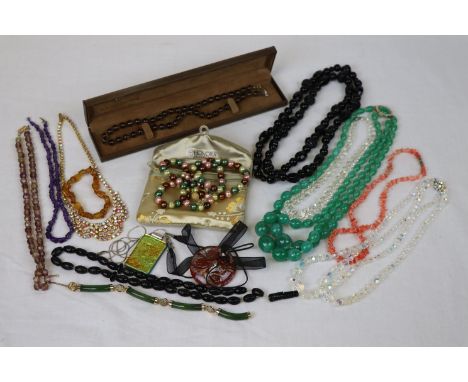 Box of vintage costume jewellery to include copal bracelet, coral bead necklace, amethyst bead necklace, circa 1950s paste ne