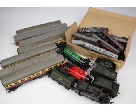 Hornby & Triang. A collection of O gauge model railway trains, coaches & trucks, locomotives include Triang blue & yellow Tra