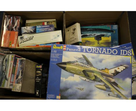 Model kits. Twenty-three boxed Revell kits, mostly aircraft, train & ship related, contents unchecked, together with five box