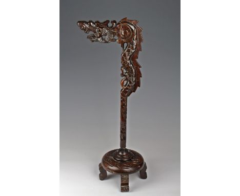 Chinese carved hardwood lantern stand in the form of a dragon, height 67.5cm approx.