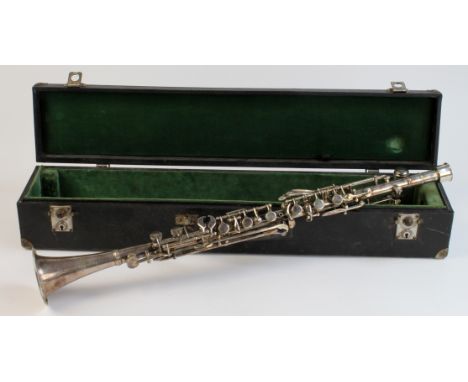 Metal clarinet by F. Buisson, Paris, with mouthpiece, contained in original case, length 68cm approx.