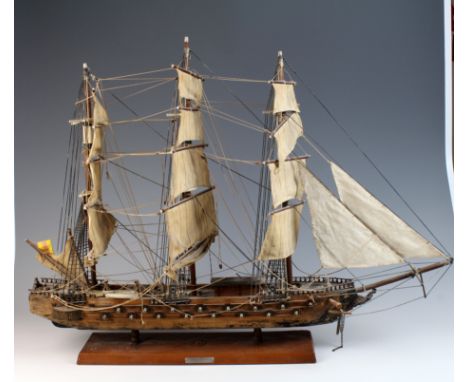 Wooden tall ship model of the Fregata espanola with cloth sails on wooden plinth, height 60cm approx.