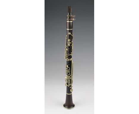 Three piece rosewood clarinet by E. J. Albert, Brussels, length 50cm approx.