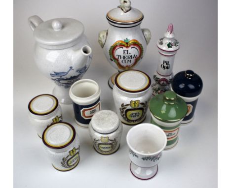 Apothecary.  Eleven ceramic apothecary jars, some with lids