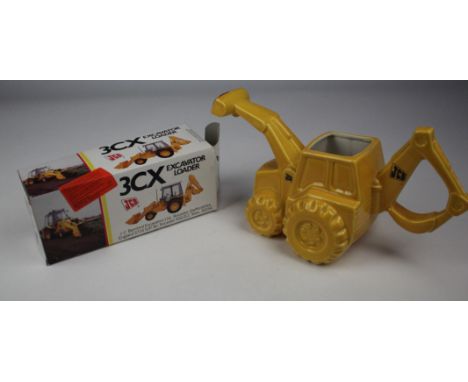 NZG Modelle JCB 3CX Excavator Loader [no. 2771], contained in original box, together with a Carltonware JCB novelty teapot