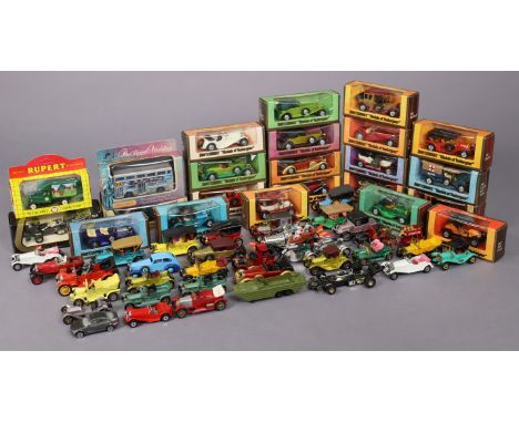 A collection of approximately fifty various die-cast scale model vehicles, boxed &amp; un-boxed.