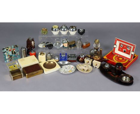 A collection of vintage table lighters, ashtrays, etc. including Ronson examples.