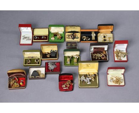 An extensive collection of vintage cufflinks, contained in approximately one hundred cases.