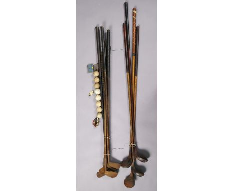 Ten various vintage golf clubs; &amp; nine various golf balls.