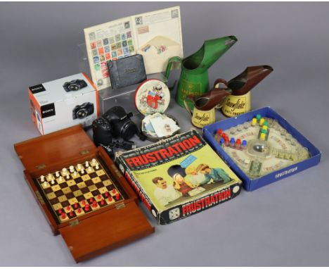 A Peter Pan “Frustration” game, boxed; a travelling chess set; an album of worldwide stamps; &amp; sundry other items.