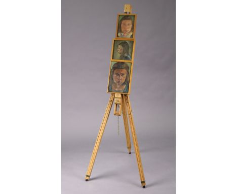 A Daler-Rowney portable artist’s easel; together with three small oil on canvas portrait studies, each in wooden frame, the l