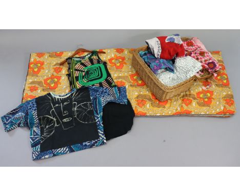 A 1960’s floral decorated sleeping bag; together with various items of vintage clothing; &amp; a wicker basket. 