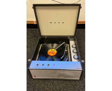 A Vintage portable Bush Record Player. In a working condition. 