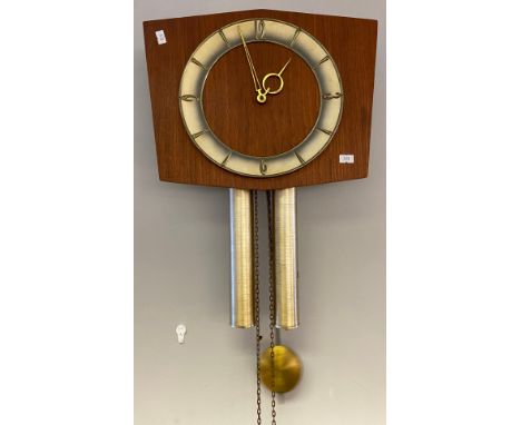 A Mid century teak wall clock with weights and pendulum. 