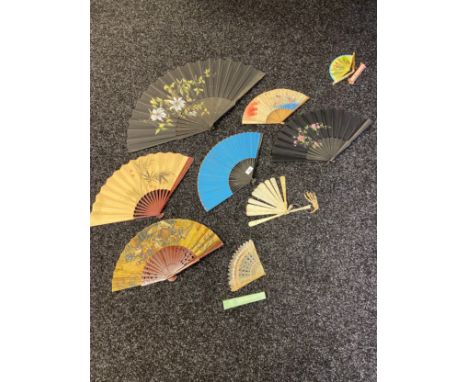 A Collection of vintage and antique hand held fans to include Chinese hand carved panel fan with tassels, black silk fan with