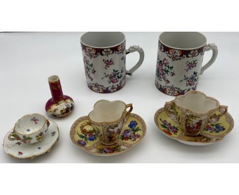 A Collection of antique porcelain to include two panel painted Meissen style loving cups with saucers, Meissen floral cup and