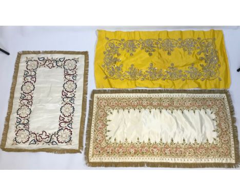 A Collection of antique and vintage embroidered table covers and wall panels, table covers are done in silk with gold and sil